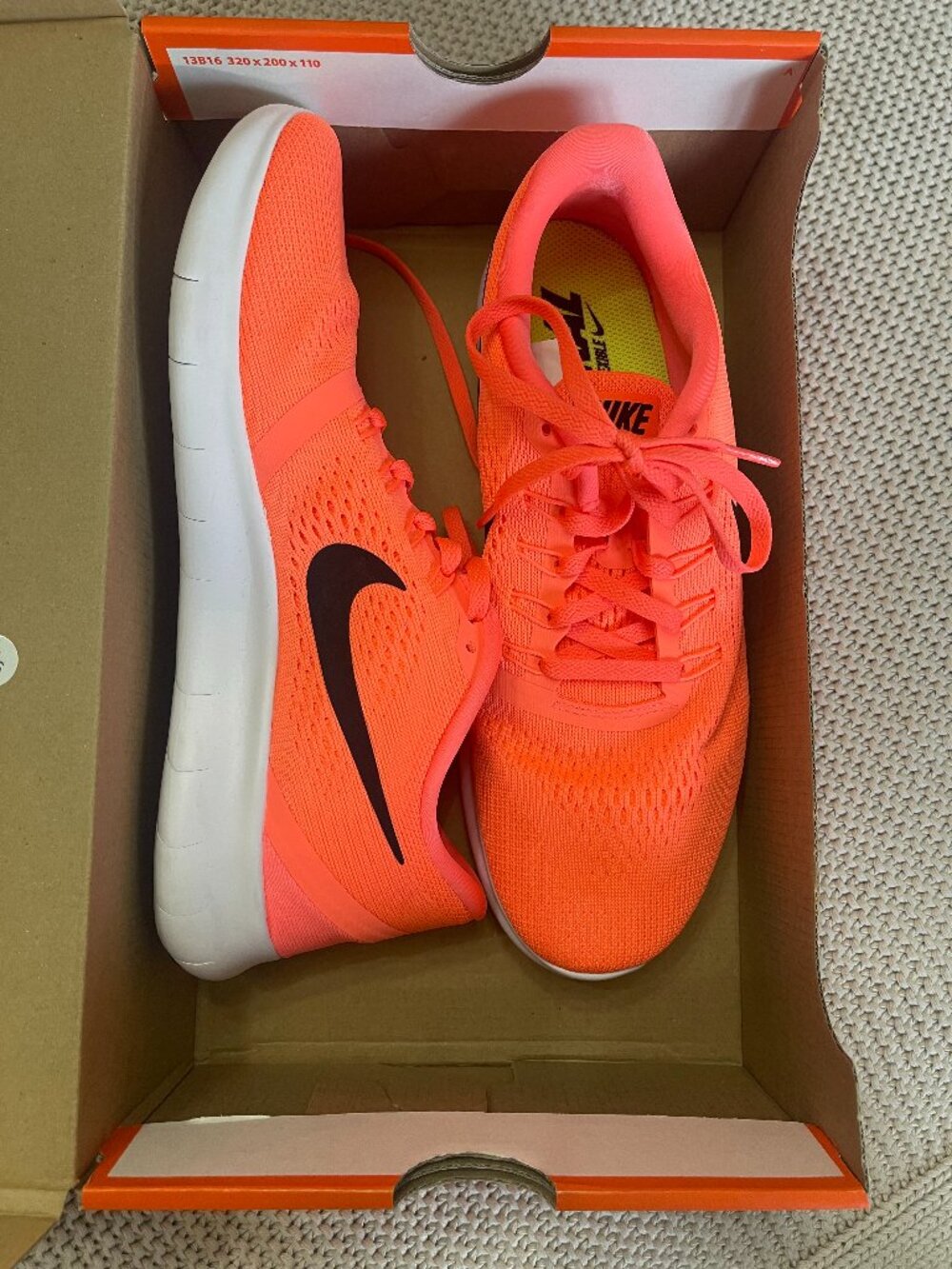 Nike Women’s Neon Coral Running Shoes